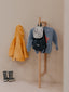 Portant à vêtements décoratif en bois massif pour enfants, ajoutant une touche de charme à leur chambre