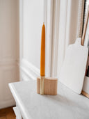 Bougeoir soliflore en bois brut pour une ambiance épurée
